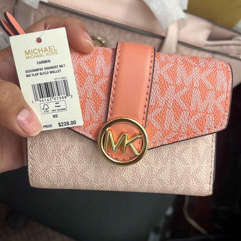 Selling brand new bad with wallet original no receipt as for it was a gift